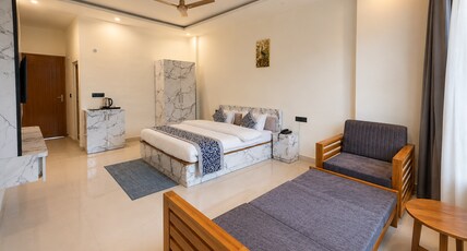 Shikhar Homestay Room Type - Deluxe Room with Sofa cum Bed