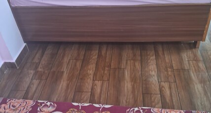 1 BHK Deluxe Room with AC Room Type - Bedroom 1