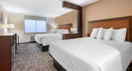 Best Western Post Inn Room Type - 1 King 1 Queen, Non-Smoking, Microwave And Refrigerator, Wi-Fi, Full Breakfast
