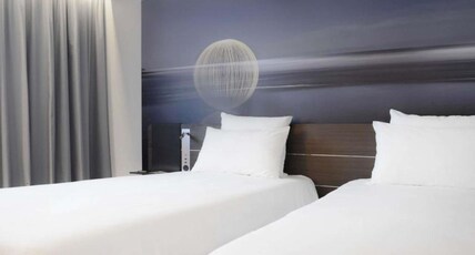 Novotel Valence Sud Room Type - Family Suite with 1 double bed, twin beds and 1 double sofa bed