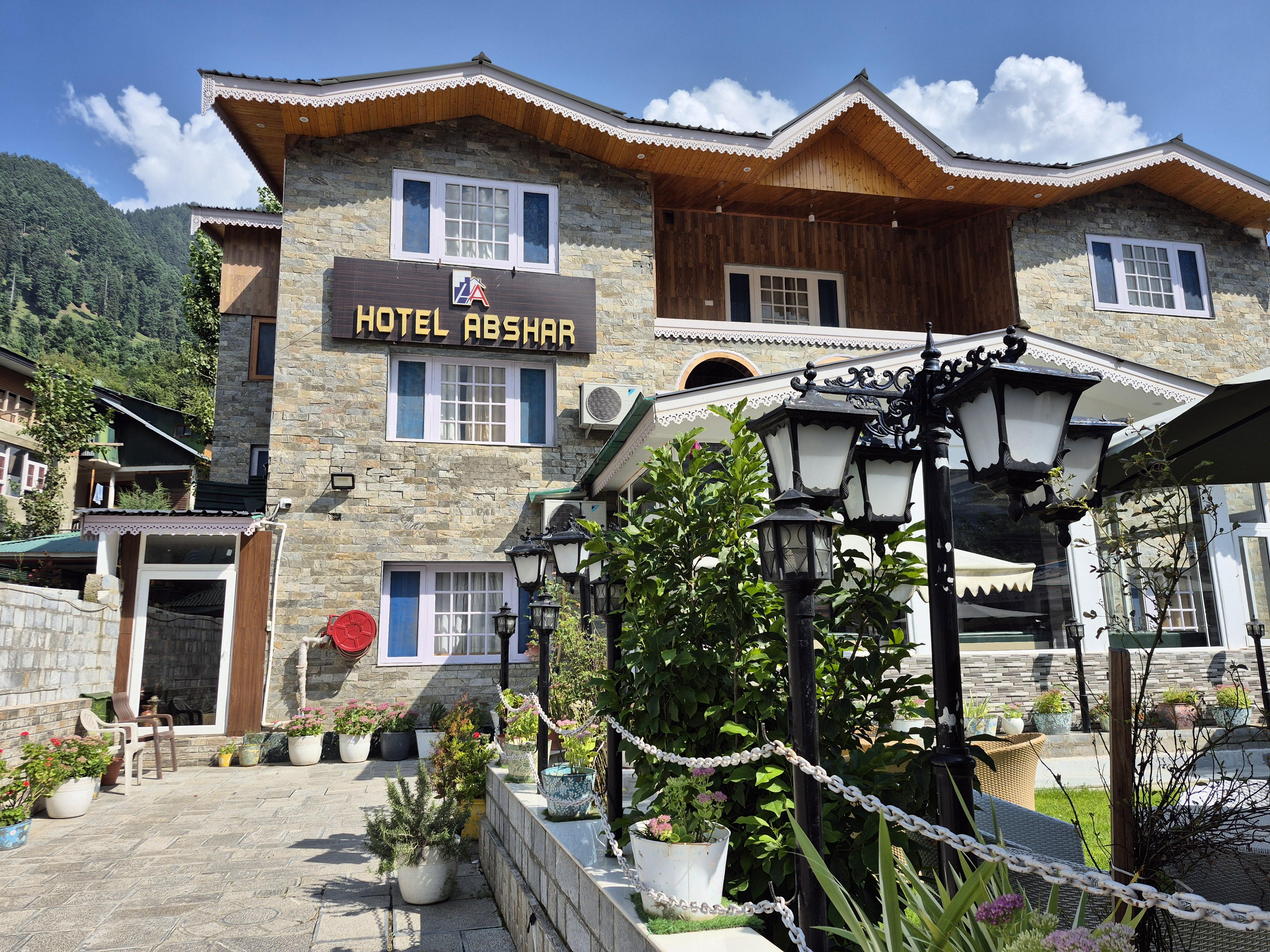 Hotel Abshar - Tap to explore photos