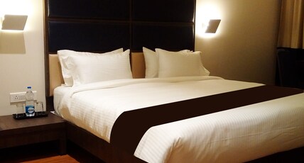 Hotel Grandeur Near Chakan MIDC Room Type - Deluxe King Bed Room with Work Desk