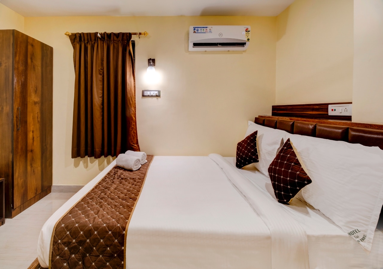 Hotel Sai Rain Tree - Tap to explore photos