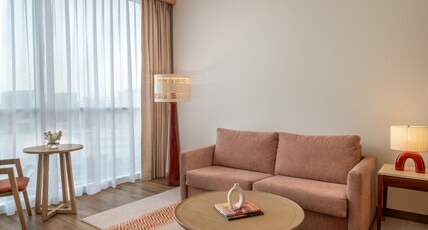 YAS PLAZA CIRCUIT by IHG - Theme Park Access Room Type - Deluxe Family Queen Room Plaza View Theme Park Access YAS PLAZA CIRCUIT by IHG - Theme Park Access Room Type - Deluxe Family Queen Room Plaza View Theme Park Access