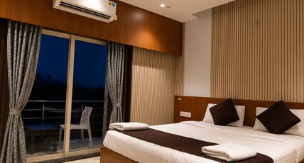 TH HIGHLAND MIST Room Type - Deluxe Double - A/c