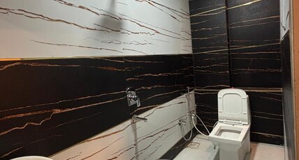 HOTEL KASHI VISHWANATH Room Type - 3 Bedded AC Room on Ground Floor