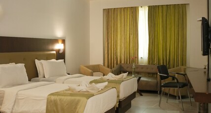 SRINIVAS SAFFRON HOTEL, MANGALORE Room Type - Deluxe Twin Bed