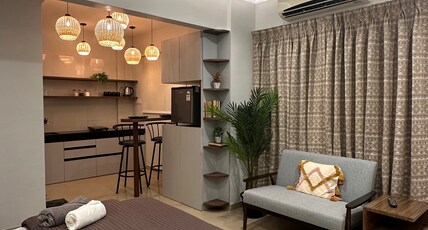 Studio Apartments by Abhibha Stays Room Type - Boho: Premium studio with balcony