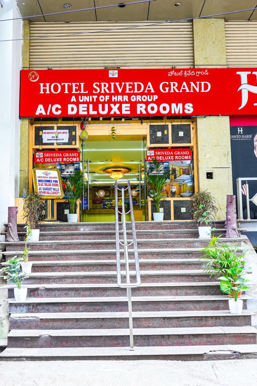 Hotel Sriveda Grand - Tap to explore photos