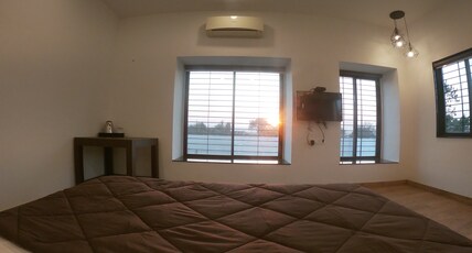 Tripvana Patio Home Room Type - King Room with extra bed