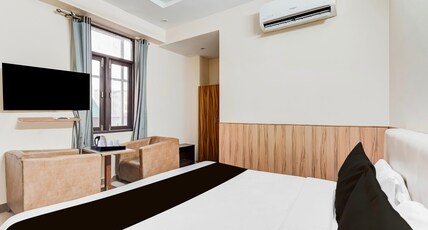 Collection O Rispana Pul Dehradun Formerly Hotel Square 1 Room Type - Deluxe