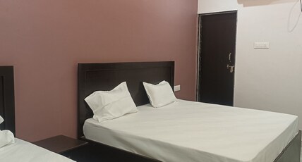 kanakdhara aashraya Room Type - Deluxe Triple Room with 1 Double Bed  1 Single Bed