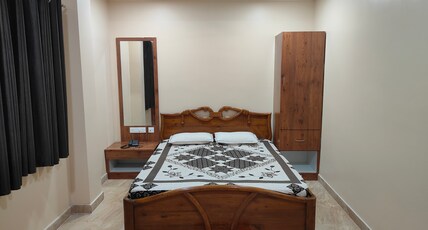 Triveni Guest House Room Type - Deluxe Non AC