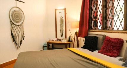 MITRA HOSTEL  VAGATOR BEACH ROAD Room Type - Deluxe Room with Balcony