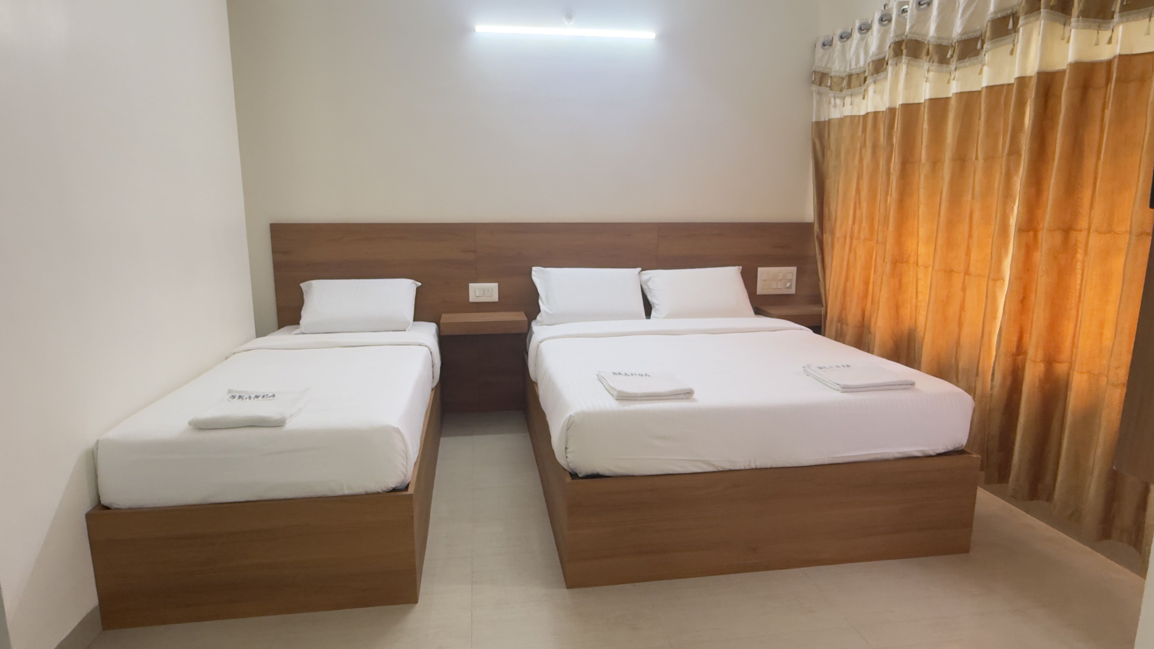 Hotel Sai Skanda - Tap to explore photos