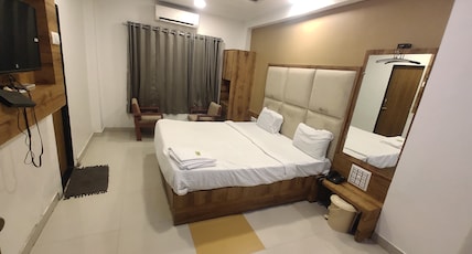 SAFARI HOTEL & RESORT-BY SOMSANIDHYA RESORT Room Type - Standard AC Room SAFARI HOTEL & RESORT-BY SOMSANIDHYA RESORT Room Type - Standard AC Room