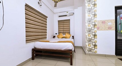 Nirupama Hotel | 700 mtrs from Aluva Railway Station Room Type - Deluxe Room With Living Area