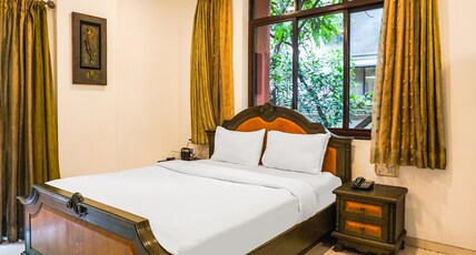 Super Townhouse Oak Prabhat Road Room Type - Deluxe