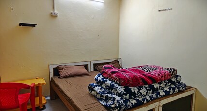 BHAJAN ASHRAM-200 Mtrs From Temple Room Type - Budget Double Room, 1 Double Bed, Outside Shared Bathroom