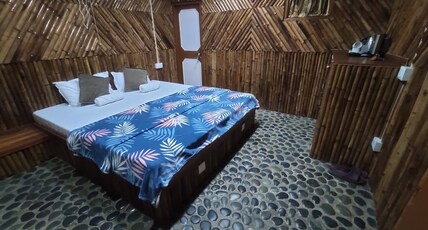 Vedic Vibes Room Type - Furnished Bamboo Hut (Double Bed)