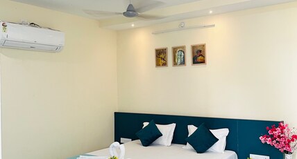 Gokul Hotel Room Type - Deluxe King Bed Room with Garden View