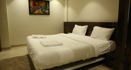 S R S Tourist Home Room Type - Premium Deluxe AC Room