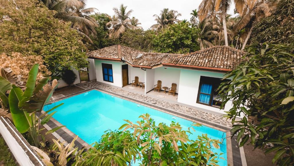 Orchid Villa by Paradise - Tap to explore photos