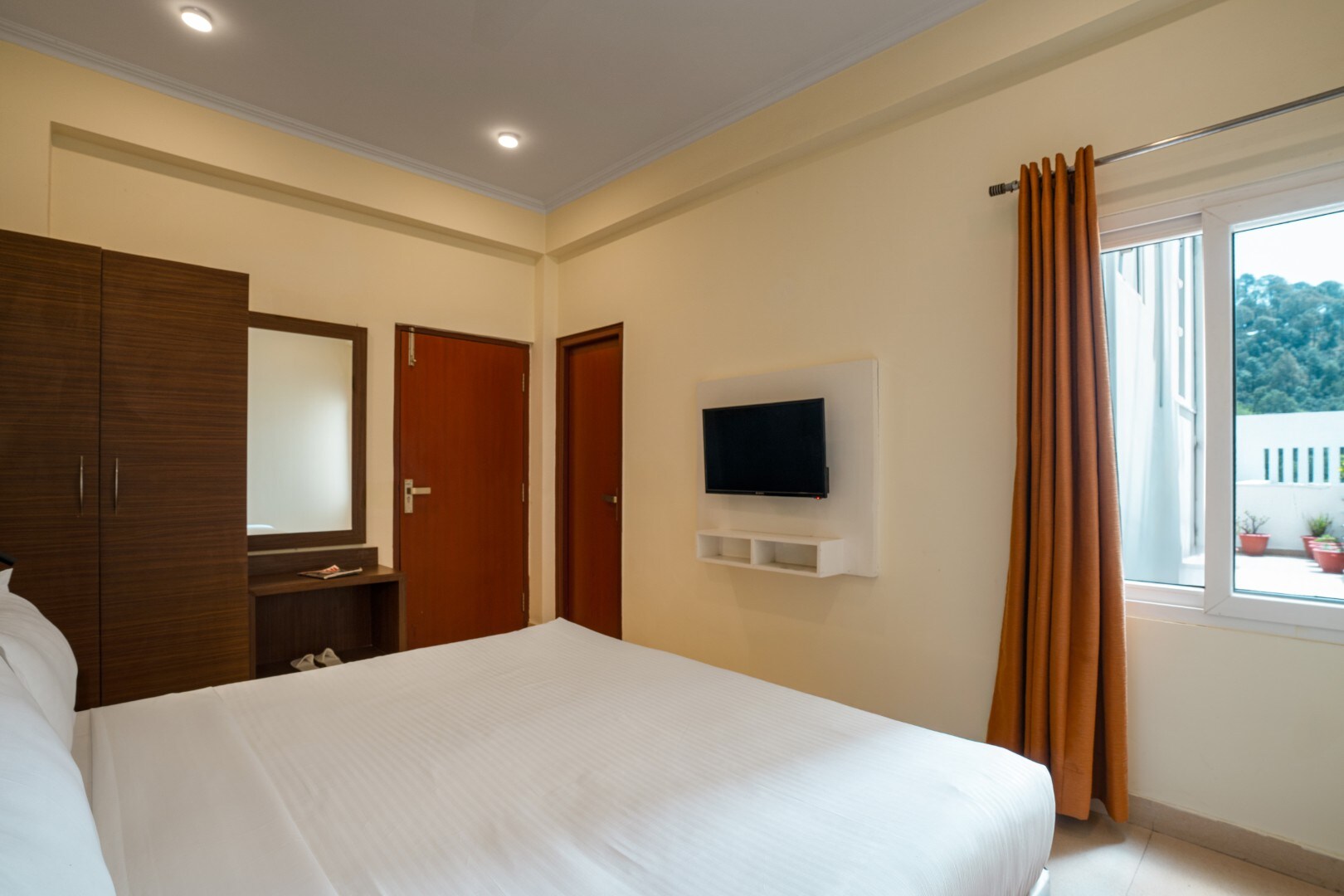 Hotel Clarks Inn, Bhowali (20 Mins from Neem Karoli Baba Ashram, Kainchi Dham) - Tap to explore photos