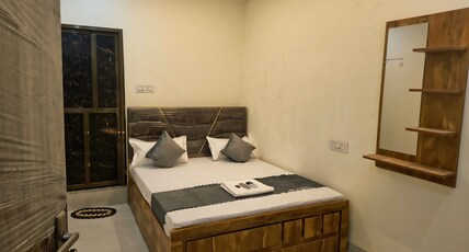 OM BED & Breakfast Guest House in varanasi Room Type - Superb Deluxe Rooms = 101( TV+ AC+ Attached washroom)