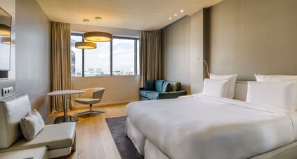 Pullman Brussels Centre Midi Room Type - FRIENDS AND FAMILY ROOM, 1 King Size Bed (or 2 Single Size Beds) and 1 Sofa bed, City View Pullman Brussels Centre Midi Room Type - FRIENDS AND FAMILY ROOM, 1 King Size Bed (or 2 Single Size Beds) and 1 Sofa bed, City View
