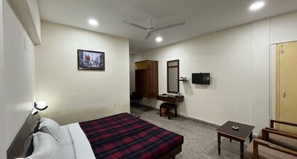 Gautam Hotel Room Type - Deluxe Room