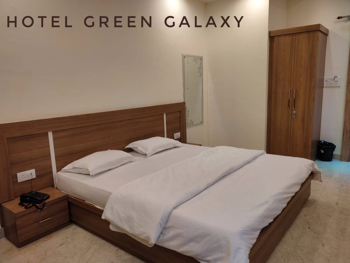 Hotel Green Galaxy - Tap to explore photos