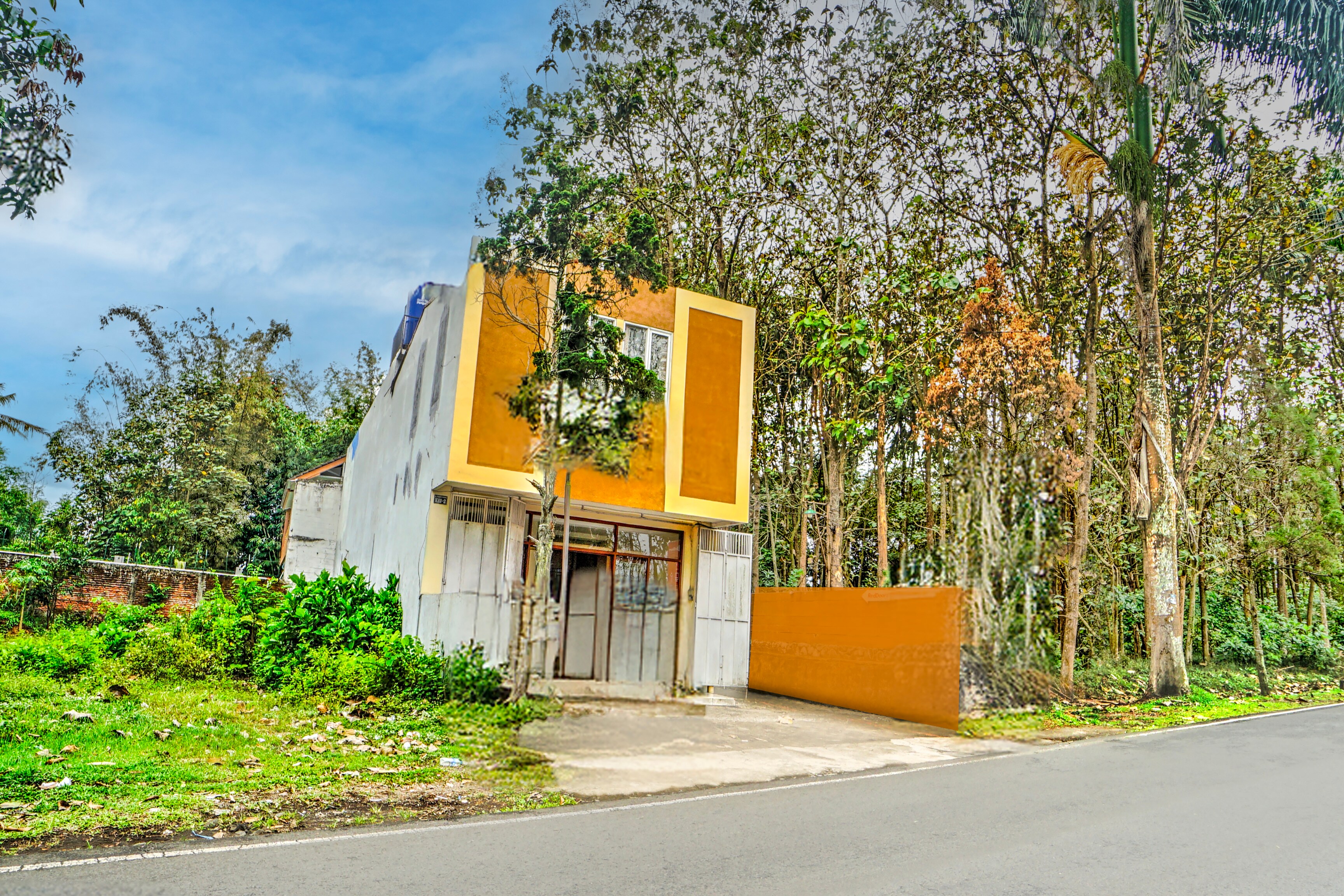 Hotel O The Velodrome Inn near Exit Toll Malang - Tap to explore photos
