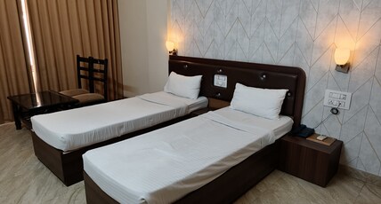 Hotel Gulmohar Pride Room Type - Deluxe AC Twin Bed Room