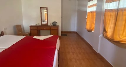 Om Shanthi Homestay Room Type - Deluxe AC Room Om Shanthi Homestay Room Type - Deluxe AC Room