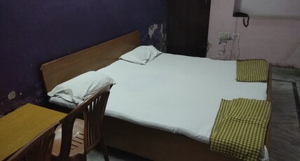 Chandar Guest House Room Type - Budget Room with outside washroom