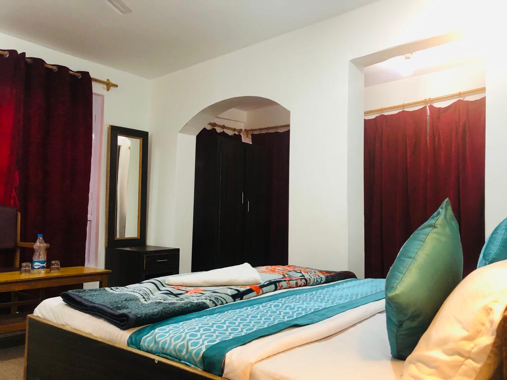 HOTEL DARUL TAWHEED - Tap to explore photos