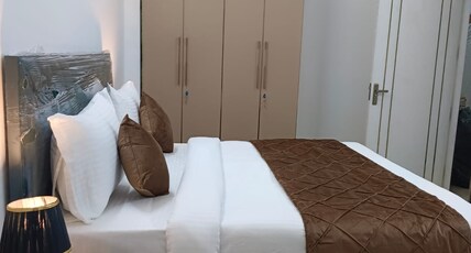 Yashobhoomi Suites Room Type - Deluxe Room