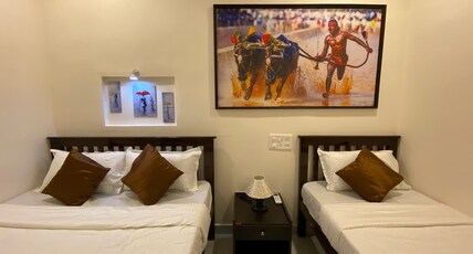 Udupi Inn | Rooms & Dorms Room Type - Deluxe Triple