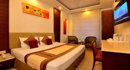 HOTEL BABA INN By RCG HOTES Room Type - Deluxe AC Room With WiFi