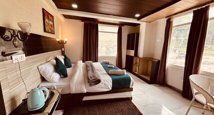 HOTEL NEW URVASHI Room Type - Deluxe Room