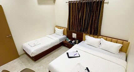 HOTEL RIVA-INN Room Type - Deluxe Triple Bed