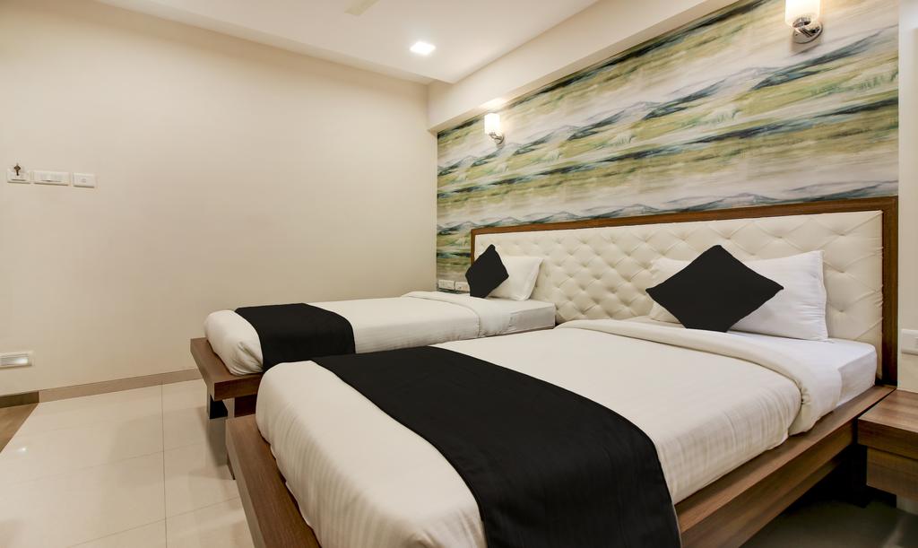 Hotel Vrushali Inn - Tap to explore photos