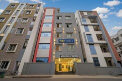 FabHotel AIG Broholic - 250m from AIG Hospital