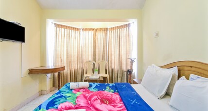 Rainbow Cottages-Budget Friendly Rooms & Restaurant Room Type - Double Cot  Deluxe Room