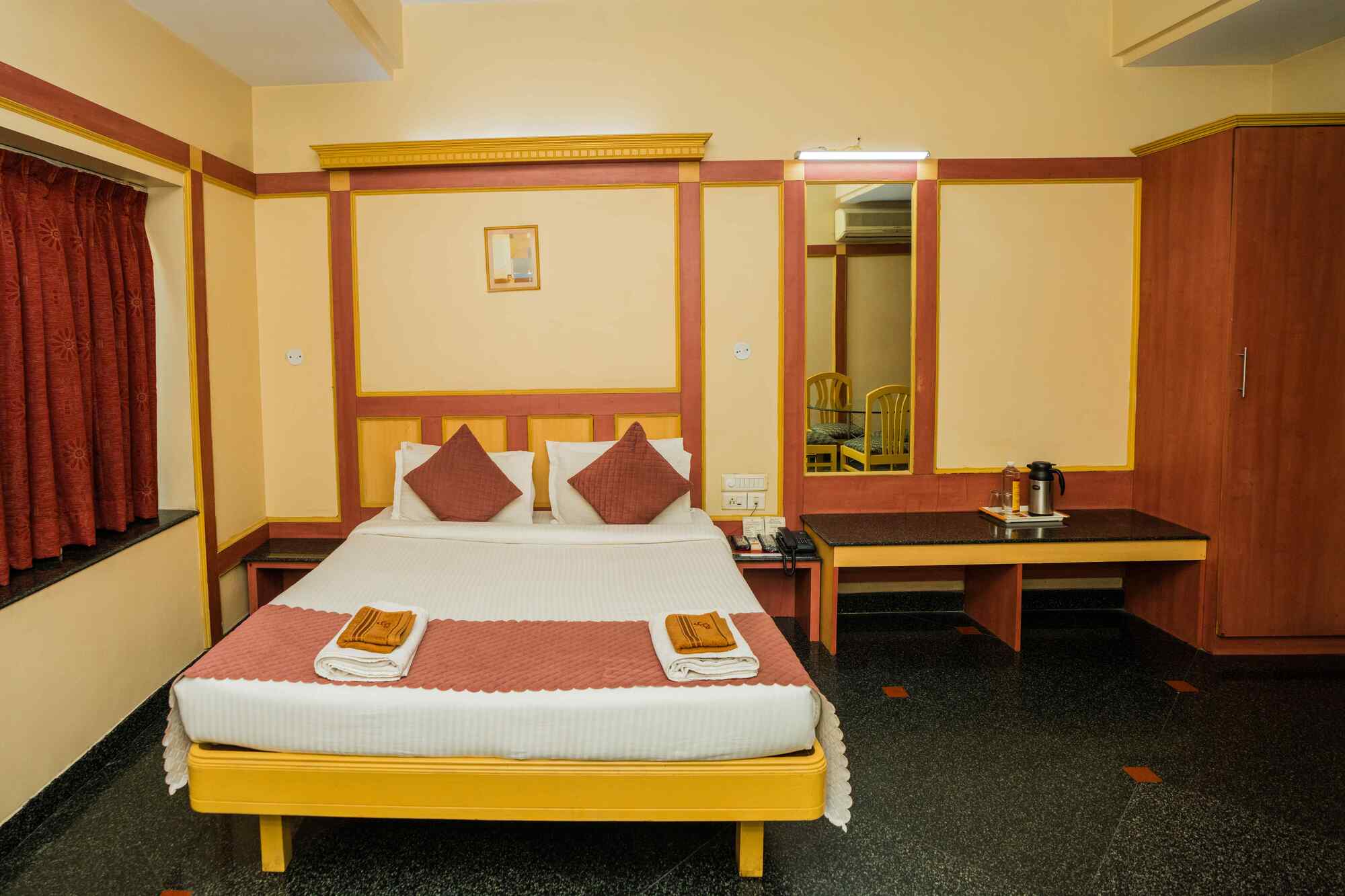 FabHotel Raj Inn- Nr. KIMS - Sunshine Hospitals, Begumpet - Tap to explore photos