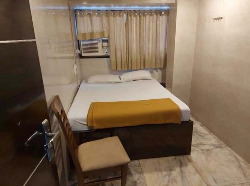 Sai Guest House By Glitz Hotels - Tap to explore photos