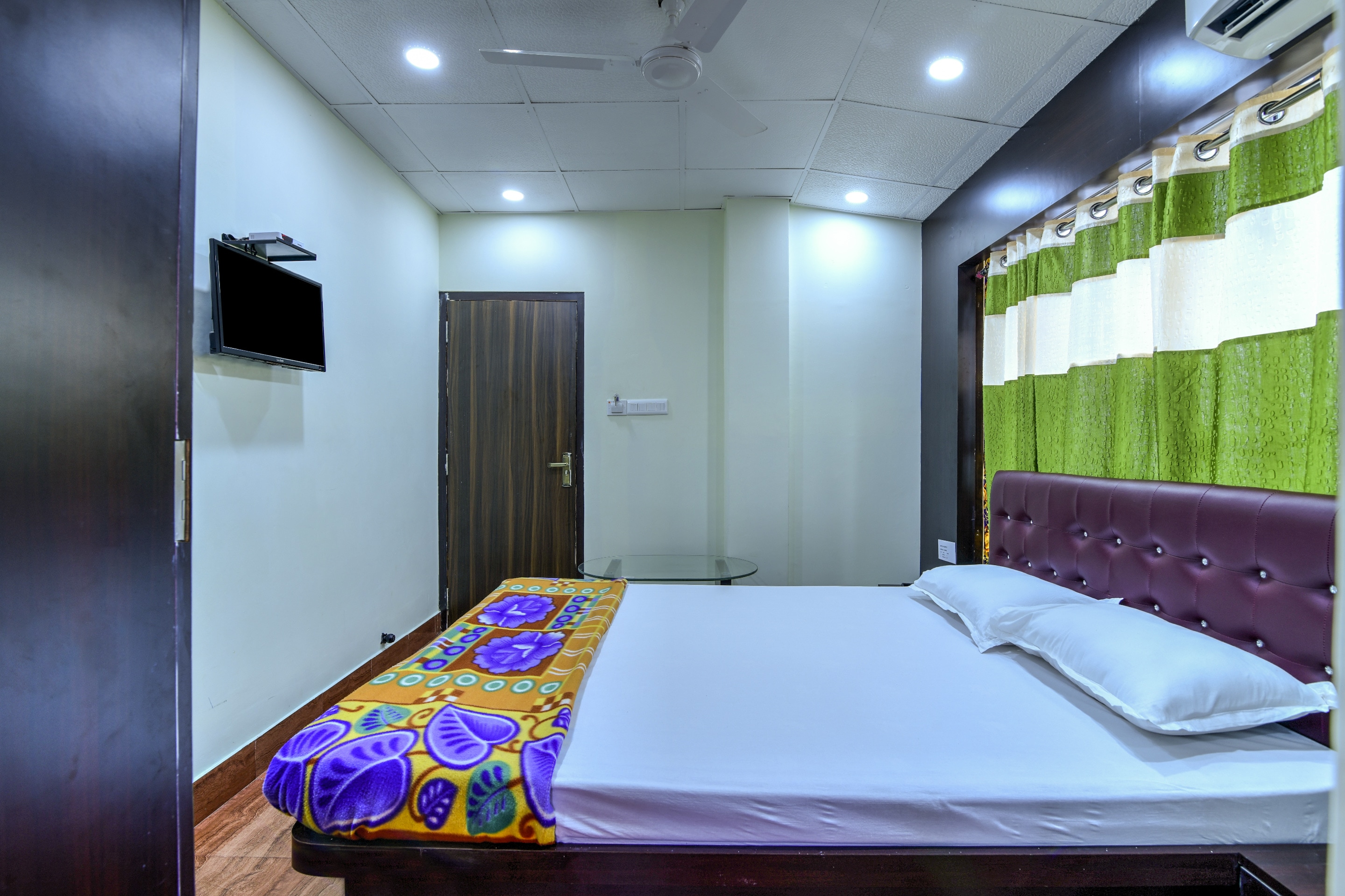 NH Regency | AC Rooms & WiFi - Tap to explore photos