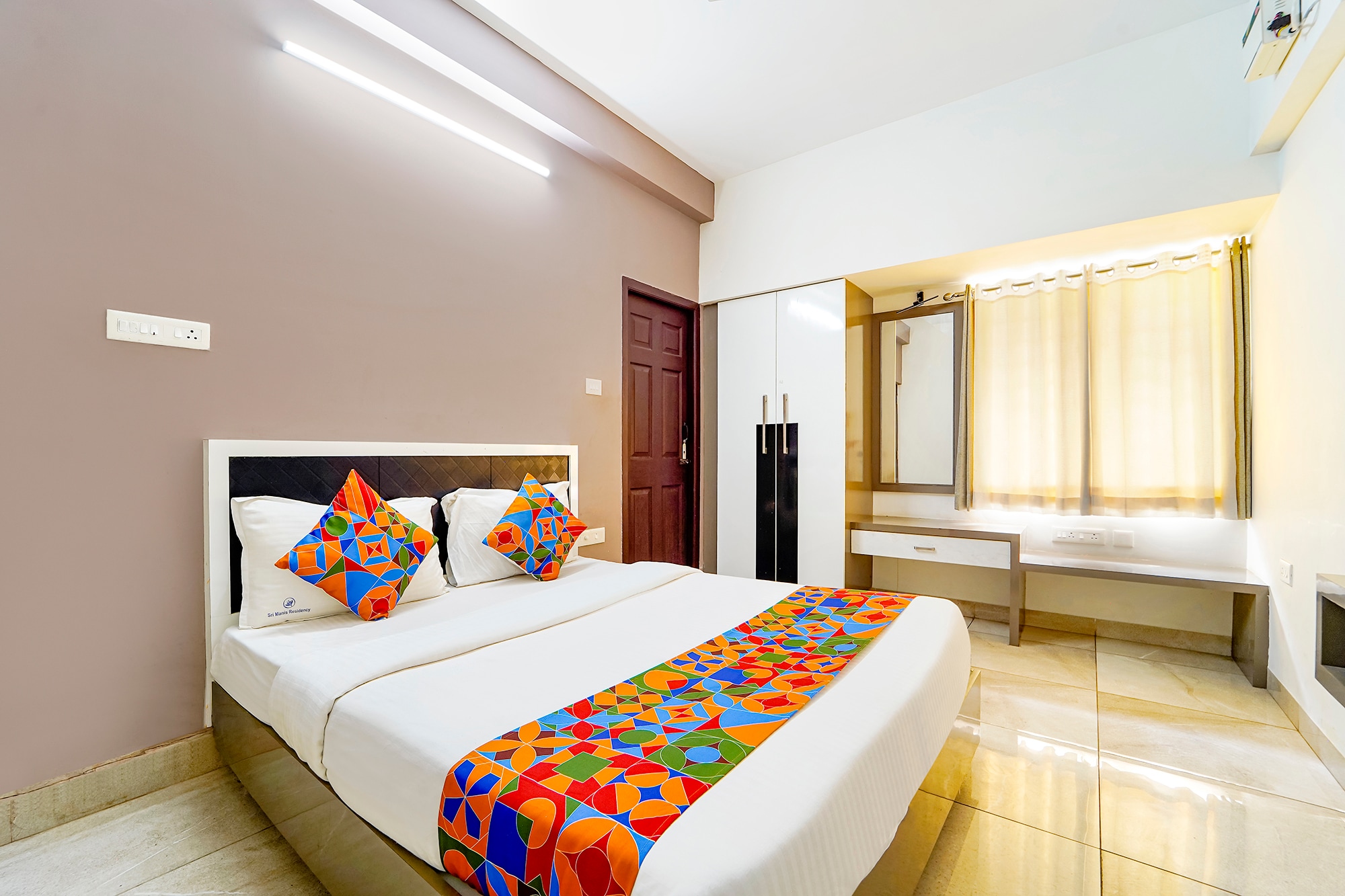 FabHotel New Paradise Inn - Tap to explore photos