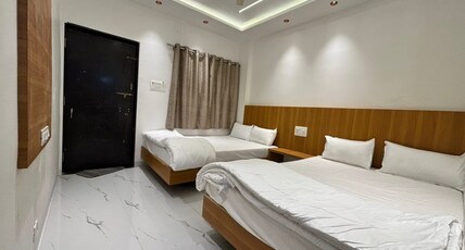 Shiv Amrut Residency Ellora Room Type - Bedroom